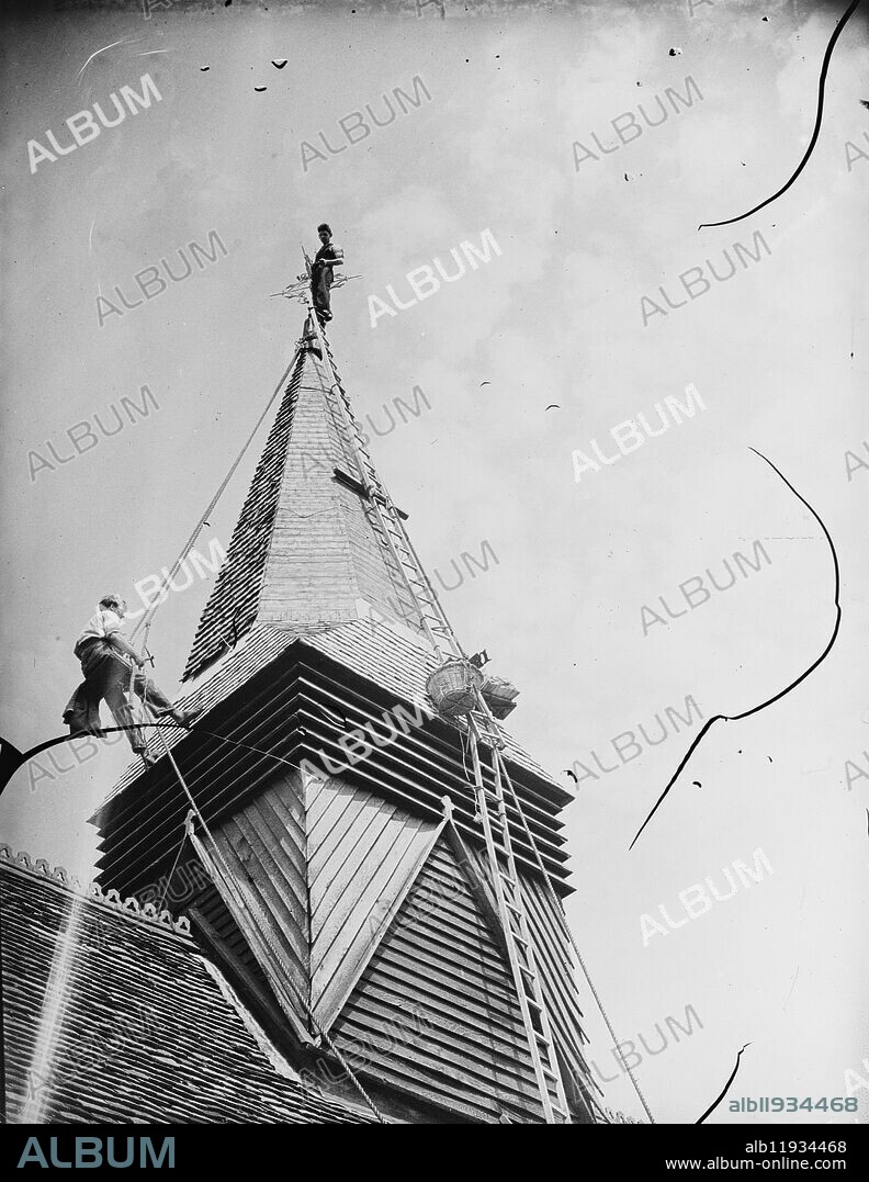 Footscray Church steeple being re - shingled . 1939.