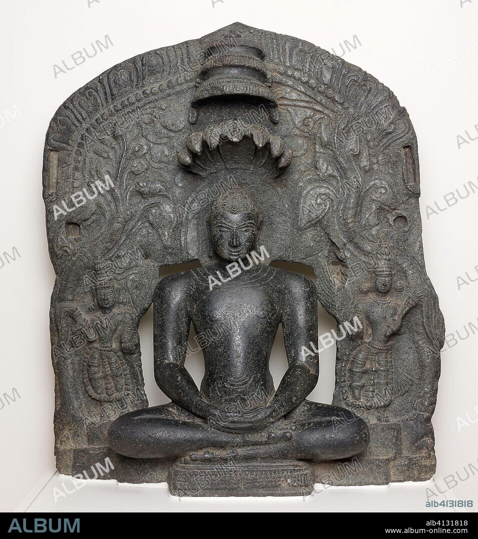 Jaina Tirthankara Parshvanatha with Serpent Hood Seated in Meditation (Dhyanamudra). India; Karnataka. Date: 1101-1200. Dimensions: 85.3 x 74.0 x 23.8 cm (33 9/16 x 29 1/8 x 9 3/8 in.). Chlorite. Origin: Karnataka.