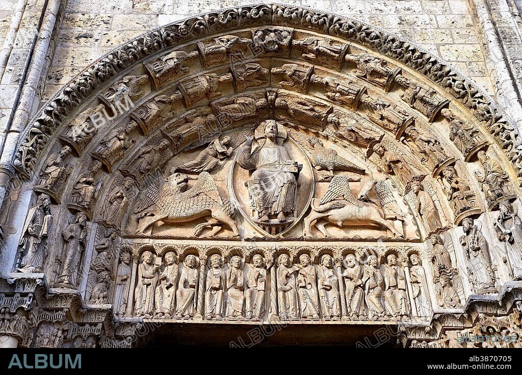 Gothic sculptures of Christ Pantocrator surrounded by the four Evangelist symbols, west facade, central portal tympanum, circa 1145, Cathedral of Chartres, UNESCO World Heritage Site, France