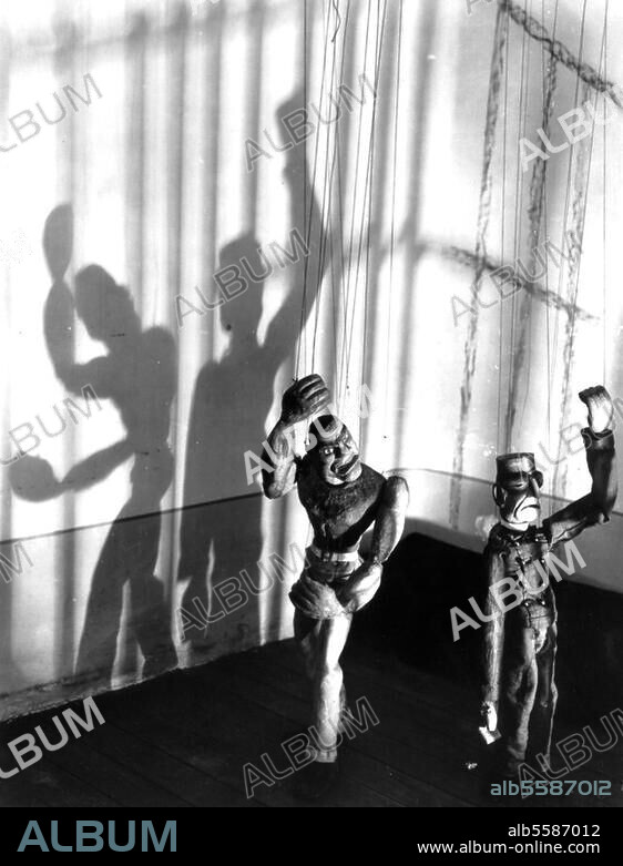 TINA MODOTTI. Modotti, Tina Italian-Mexican photographer, 1896-1942. "Puppets", Mexico, 1926. Photo.