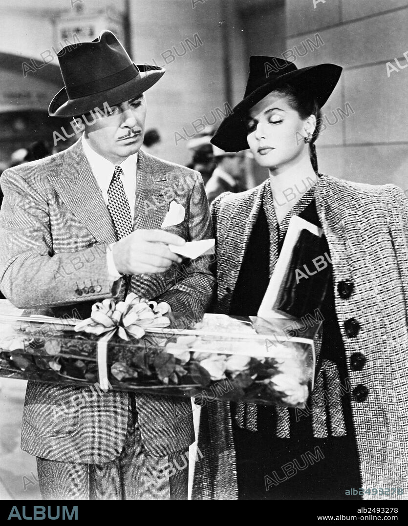ANN SHERIDAN and GEORGE BRENT in HONEYMOON FOR THREE, 1941, directed by LLOYD BACON. Copyright WARNER BROTHERS.
