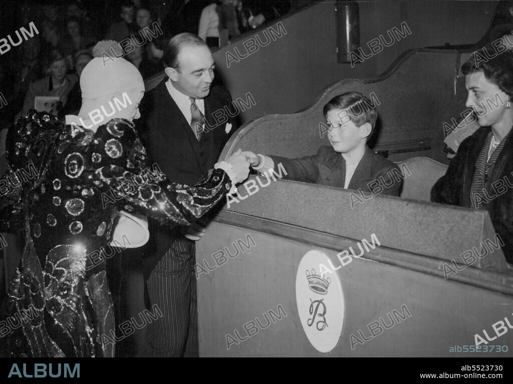 Duchess Of Kent And Children Meet The Circus Clown -- Percy Huxter, the clown, chats to Prince Michael and the Duchess of Kent with Clown at Olympia today.Prince or commoner alike are thrilled by the "sawdust ring". No more appreciative spectators could be found than Prince Michael, Prince Edward Duke of Kent or Princess Alexandra, all of whom went with their mother, the Duchess of Kent today (Wednesday) to see Bertram Mills Circus at Olympia, London. December 29, 1948. (Photo by Reuterphoto).