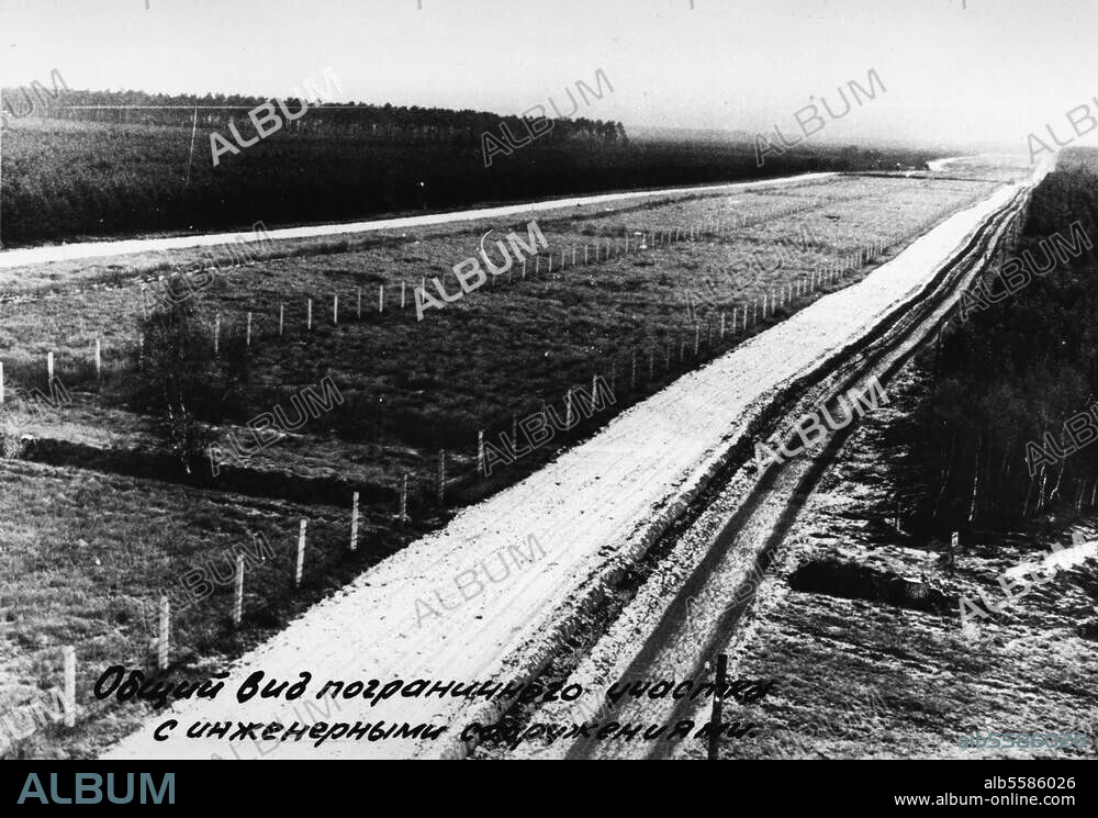 Germany, Inner German border, Border fortifications FRG / GDR:. View of the border, fortified with two lines of barbed wire. Photo, c. 1964.