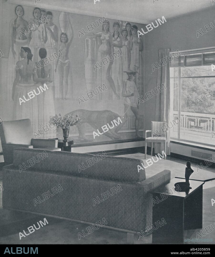 'Living room in the Cafritz residence in Georgetown, Nr. Washington D.C., USA, decorated by Eugene Schoen in ice-blue, grey and lemon', 1942. Mural by Durenceau, hangings by Morton Sundour, and floor covered with Mohawk carpet. From Decorative Art 1942 - The Studio Year Book, edited by C. G. Holme. [The Studio Ltd., London, 1942].