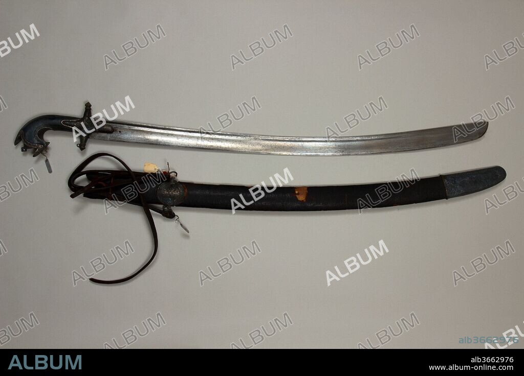Sword (Saif) with Scabbard. Culture: Indian, Hyderabad or Arabian. Dimensions: H. with scabbard 37 3/4 in. (95.9 cm); H. without scabbard 36 in. (91.4 cm); W. 4 1/2 in. (11.4 cm); Wt. 1 lb. 11.2 oz. (771.1 g); Wt. of scabbard 9.3 oz. (263.7 g). Date: 18th-19th century.