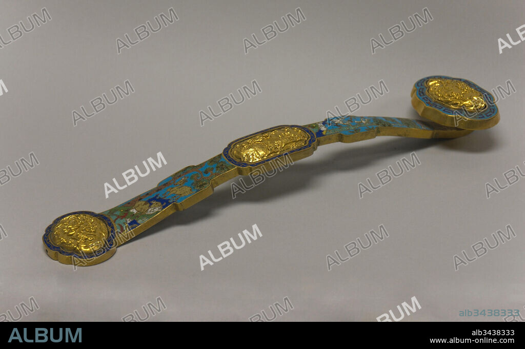 Ruyi Scepter, Qing dynasty (1644–1911), 18th–19th century, China, Cloisonné enamel with gilt-bronze medallions, L. 17 1/2 in. (44.5 cm), Cloisonné, One translation of the Chinese term ruyi is 'as you wish,' and scepters in this shape were often given as gifts because of the good wishes they implied. Although they may have had certain ritual functions, scepters frequently appeared in displays, either placed on stands or in vases and brush pots alongside other functional and/or exotic goods.