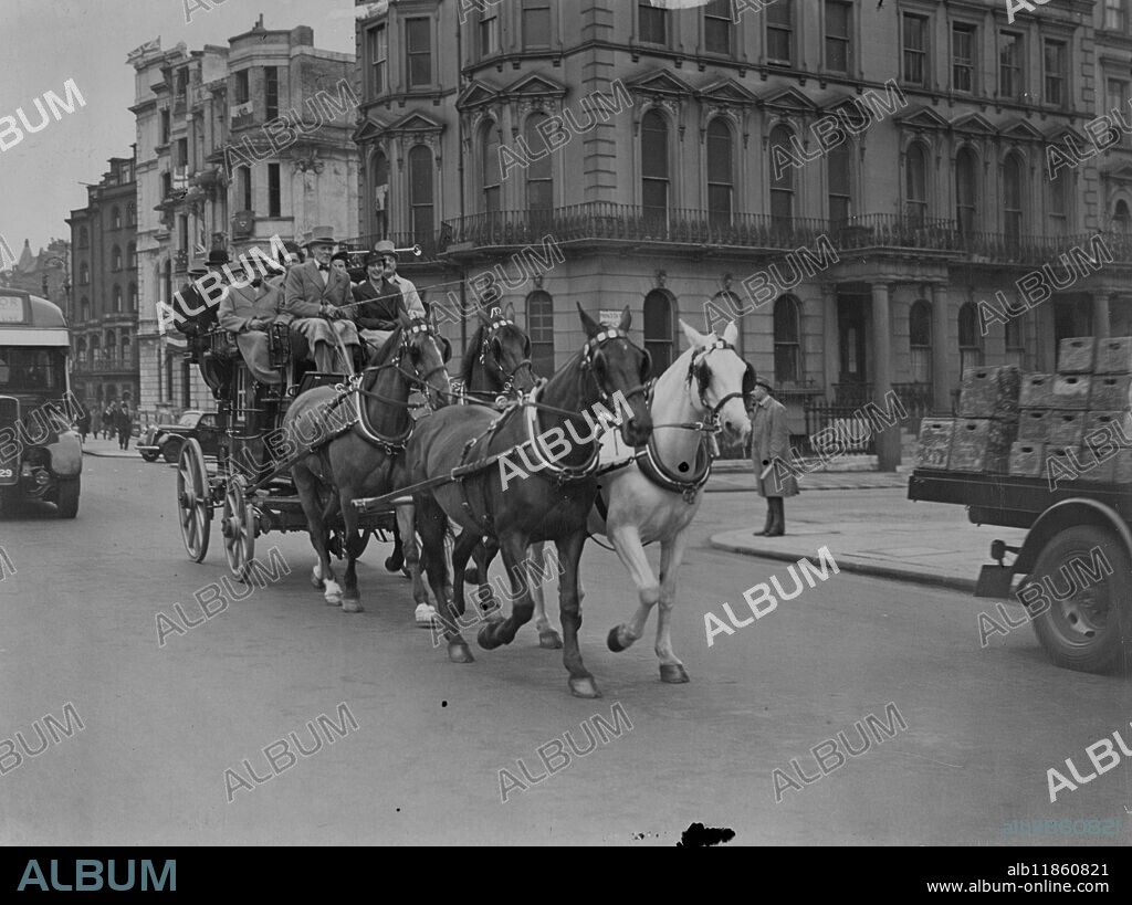 A party of 14 coaching enthusiasts left the De Vere hotel, Kensington this morning, in "The Times" Stagecoach at Epsom. The coach used to play between Northampton and Peterborough. Chairing the reins with Mr Geoffrey Holub own, a city stockbroker, is Mr Sidney Truett, one of the few remaining professional coachman he is to drive the "old Berkely" between Piccadilly and Brighton in the 1920s. Today "The Times" is being hauled by 3 days and a grey, as Mr Truett could not find a fully matched team. 5 June 1946.