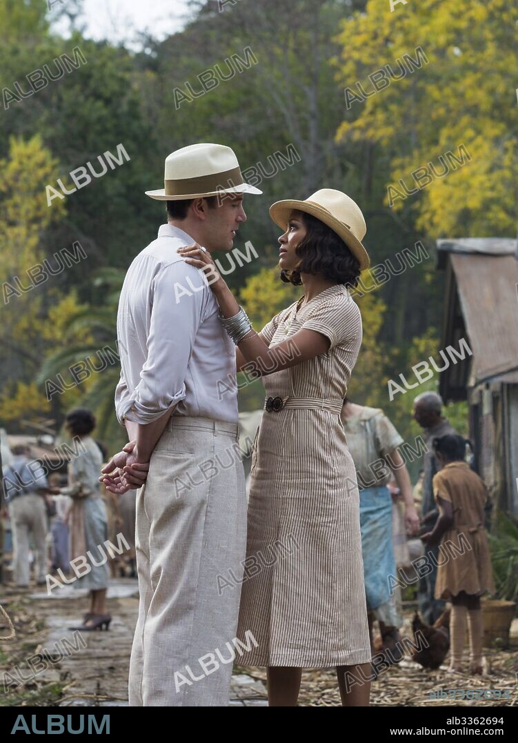 BEN AFFLECK and ZOE SALDANA in LIVE BY NIGHT, 2016, directed by BEN AFFLECK. Copyright APPIAN WAY/PEARL STREET FILMS/WARNER BROS. / FOLGER, CLAIRE.