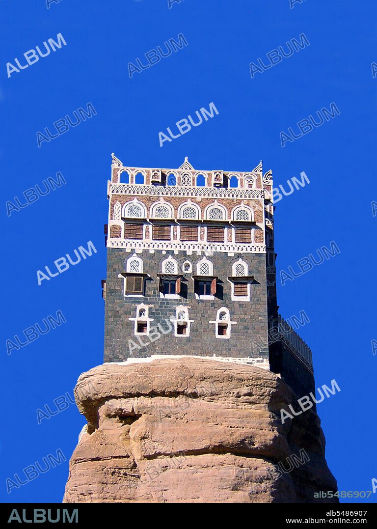 Dar Al-Hajar ('Abode of Rock', 'House of Stone'), is located in Wadi Dhahr, about 14km (9 miles) northwest of Sana'a. Situated on a rocky outcrop near the centre of the valley, Dar al-Hajar - the 'Rock Palace; - was a summer retreat for the hereditary imams of Yemen, dating back at least as far as 1786, when it was built on the instructions of Imam Mansour Ali Bin Mehdi Abbas. Although there are indications that the site may have been inhabited for many centuries, Dar al-Hajar in its present form dates from the reign of Imam Yahya in the 1930s. Standing five stories tall, it is open to the public and houses a small museum.