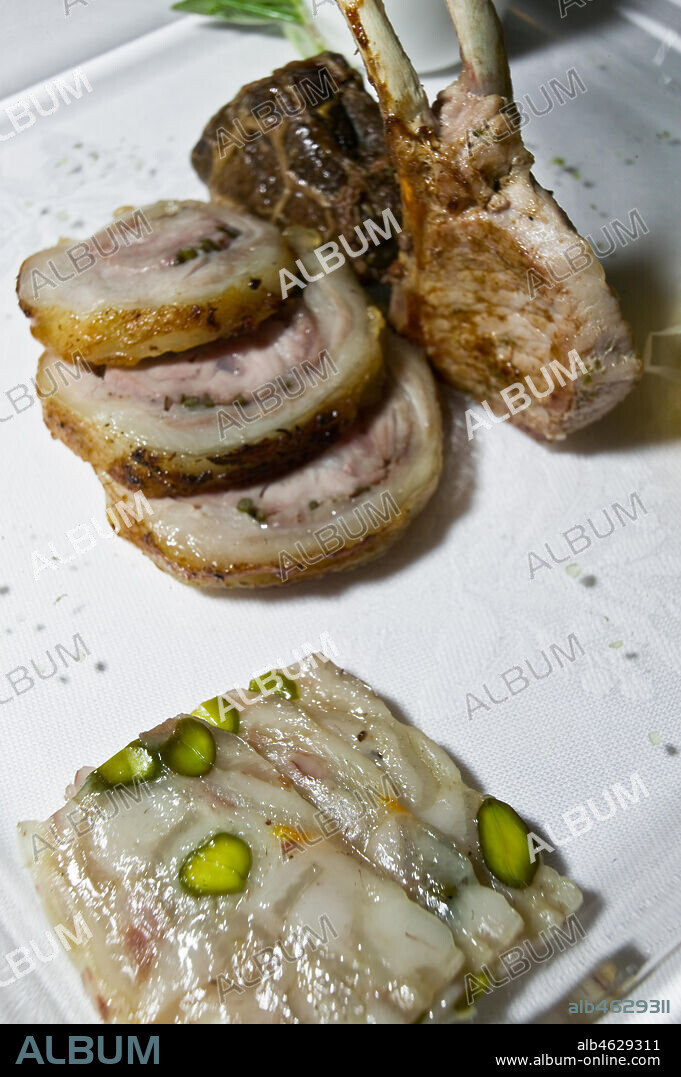 Second course: lamb and pork roast, and a typical cold cut "coppa di testa".