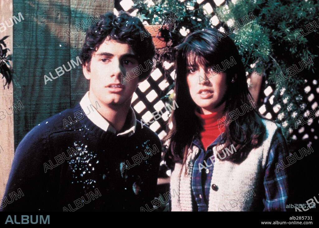 PHOEBE CATES and ZACH GALLIGAN in GREMLINS, 1984, directed by JOE DANTE. Copyright WARNER BROTHERS.