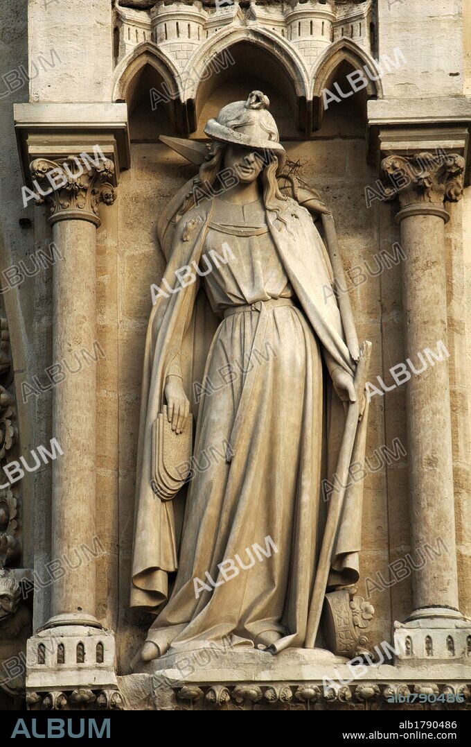 France. Pari_s. Notre Dame cathedral. Portal of St. Anne. Synagogue. AllegorycaI statue depicted with his eyes covered, her crown falling on the floor, the tables of the law reversed, falling from his hand, and holds a  banner of Judaism, which is broken. The dejected pose try to suggest defeat.