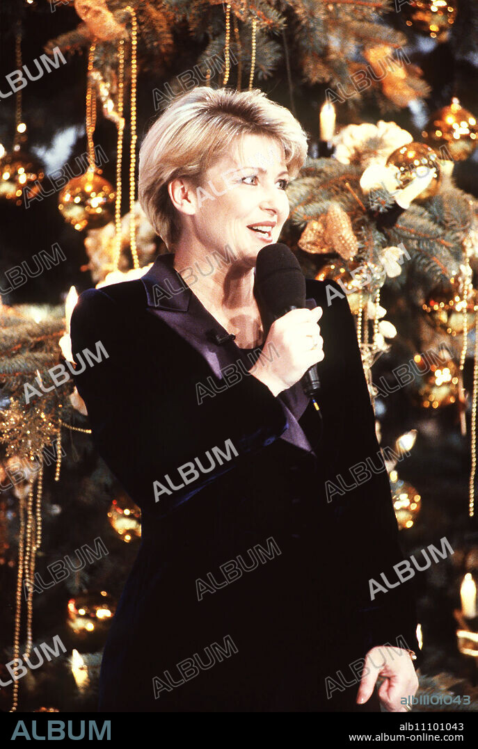 Presented by CARMEN NEBEL. / Headline: THE CHRISTMAS FESTIVAL OF FOLK MUSIC.