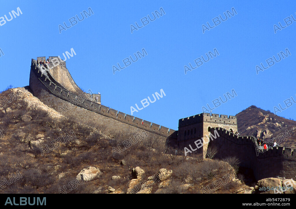 The Great Wall (Wanli Changcheng) is one of mankind's greatest achievements and dates back more than two millennia, when a series of shorter walls were systematically linked during the Qin dynasty (221-206 BCE) to protect Chinas northern borders. The Wall, originally built to keep out barbarian invaders from the north, stretches more than 5,900km (3,700 miles) from the Bohai Gulf in the Yellow Sea to Jiayuguan in the mountains of Gansu province. While the bulk of the wall is now in ruins, some sections have been repaired in recent years. The Ming rulers, who in 1368 put an end to the alien Mongol Yuan dynasty, forcing them back to their ancestral homelands outside the wall, decided to rebuild the Wall into a formidable barrier, the 'Ten Thousand Li Great Wall'. This enormous project took over 100 years, but in the end failed to prevent the invasion of China by the Manchus in the mid-17th century. As a result, much of the wall in northeast China today dates back to the Ming period.