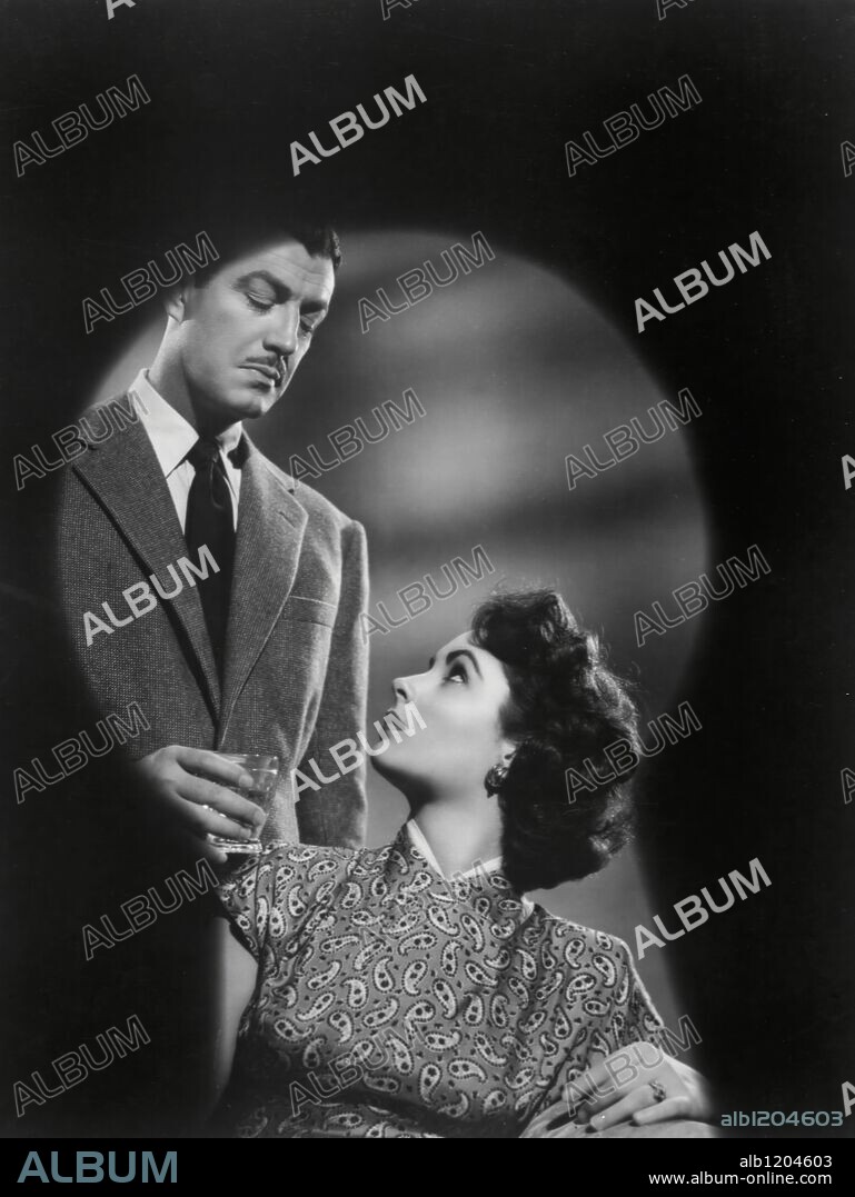 ELIZABETH TAYLOR and ROBERT TAYLOR in CONSPIRATOR, 1949, directed by VICTOR SAVILLE. Copyright M.G.M.