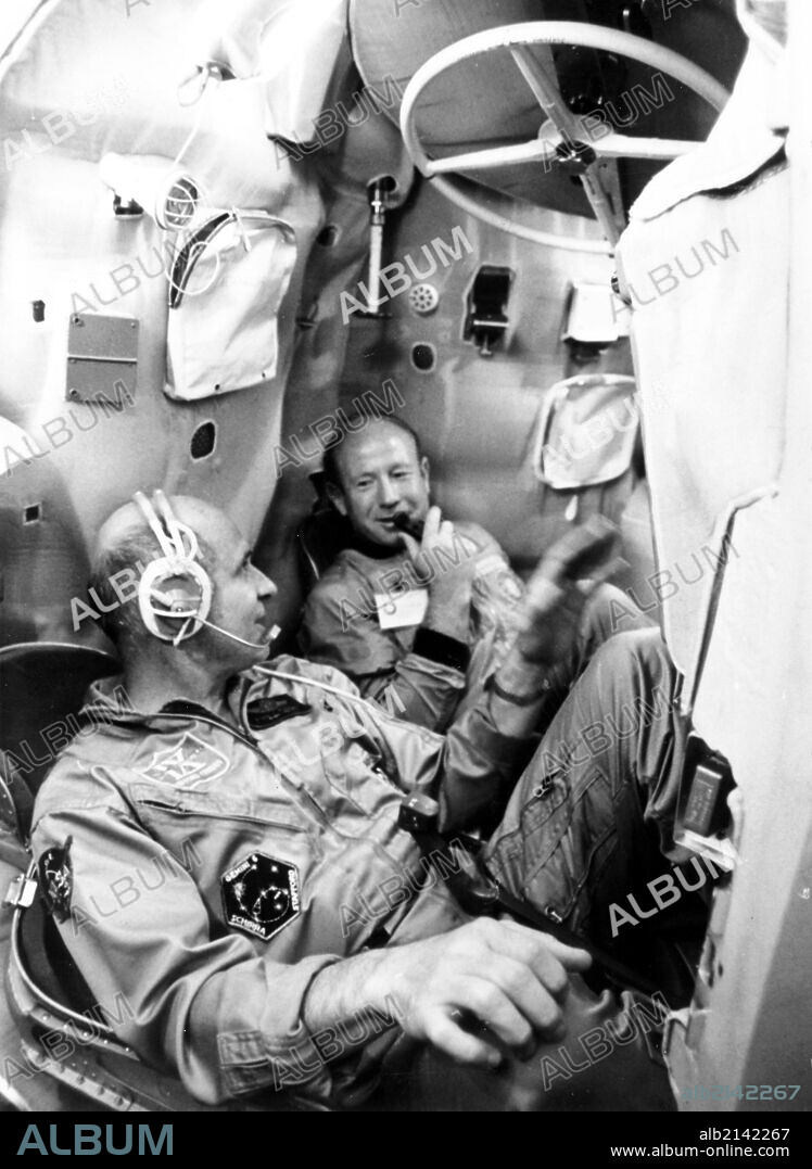 July 9, 1974, yuri gagarin spacemen's training centre, alexei leonov, commander of the first soyuz crew (right), thomas stafford, commander of the apollo flight crew, training in a mock-up soyuz spacecraft.