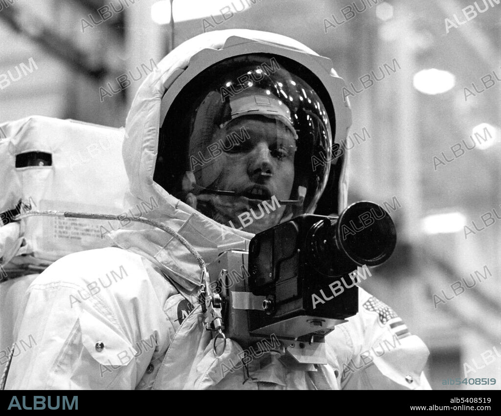 Neil Armstrong with Hasselblad camera. The camera equipment carried on the Apollo 11 flight was comprehensive. In addition to the usual TV and small-film cameras on board, there was a special camera for near-distance stereoscopic shots of the moon, the Hasselblad 500ELs. Apollo 11 was the spaceflight that landed the first two people on the Moon. Commander Neil Armstrong and lunar module pilot Buzz Aldrin landed the Apollo Lunar Module Eagle on July 20, 1969. Armstrong became the first person to step onto the lunar surface six hours later on July 21; Aldrin joined him 19 minutes later. They spent about two hours together outside the spacecraft, and collected 47.5 pounds of lunar material to bring back to Earth. Command module pilot Michael Collins flew the command module Columbia alone in lunar orbit while they were on the Moon's surface. Armstrong and Aldrin spent 21.5 hours on the lunar surface before rejoining Columbia in lunar orbit.