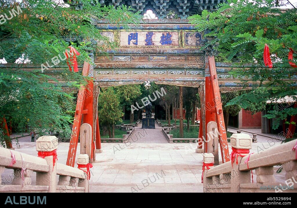 The Wen Miao (Confucian Temple) was constructed during the Ming Dynasty (1368 - 1644) and first used in 1439. Wuwei has a population of around 500,000, mainly Han Chinese, but with visible numbers of Hui as well as Mongols and Tibetans. In earlier times it was called Liangzhou. Dominating the eastern end of the Hexi Corridor, it has long played a significant role on this major trade route. Wuwei’s most famous historic artefact, the celebrated Han Dynasty (206 BCE - 220 CE) bronze horse known as the Flying Horse of Gansu, was discovered here in a tomb beneath Leitai Temple (Leitai Si) in the north part of town. Although the original is now on display in the Gansu Provincial Museum at Lanzhou, the horse’s likeness – depicted at an elegant, flying gallop, with one hoof briefly resting on the head of a flying swallow – is everywhere to be seen, most notably at the centre of Wuwei’s downtown Wenhua Square.