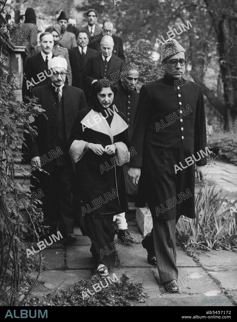 Pakistani Envoy Mourns Former Chief -- Mr. Habib Ibrahim Rahimtoola, Pakistan High Commissioner in London, the Begum Rahimtoola, and Mr. Krishna Menon, ***** High Commissioner (immediately behind Mr. Rahimtools) walking to the Islamic Cultural Centre, London to offer Funeral Prayers for the assassinated Pakistan Premier, Mr. Liaquat Ali Khan, to-day (Friday).On left, behind Begum Rahimtoola is Dr. Ardel Kader. October 19, 1951. (Photo by Reuterphoto).