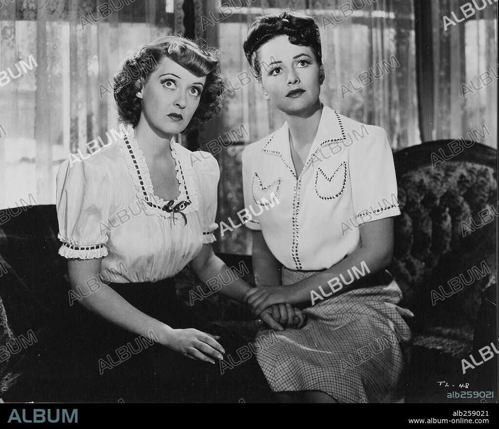 BETTE DAVIS y OLIVIA DE HAVILLAND en COMO ELLA SOLA, 1942 (IN THIS OUR LIFE), dirigida por JOHN HUSTON. Copyright WARNER BROTHERS.