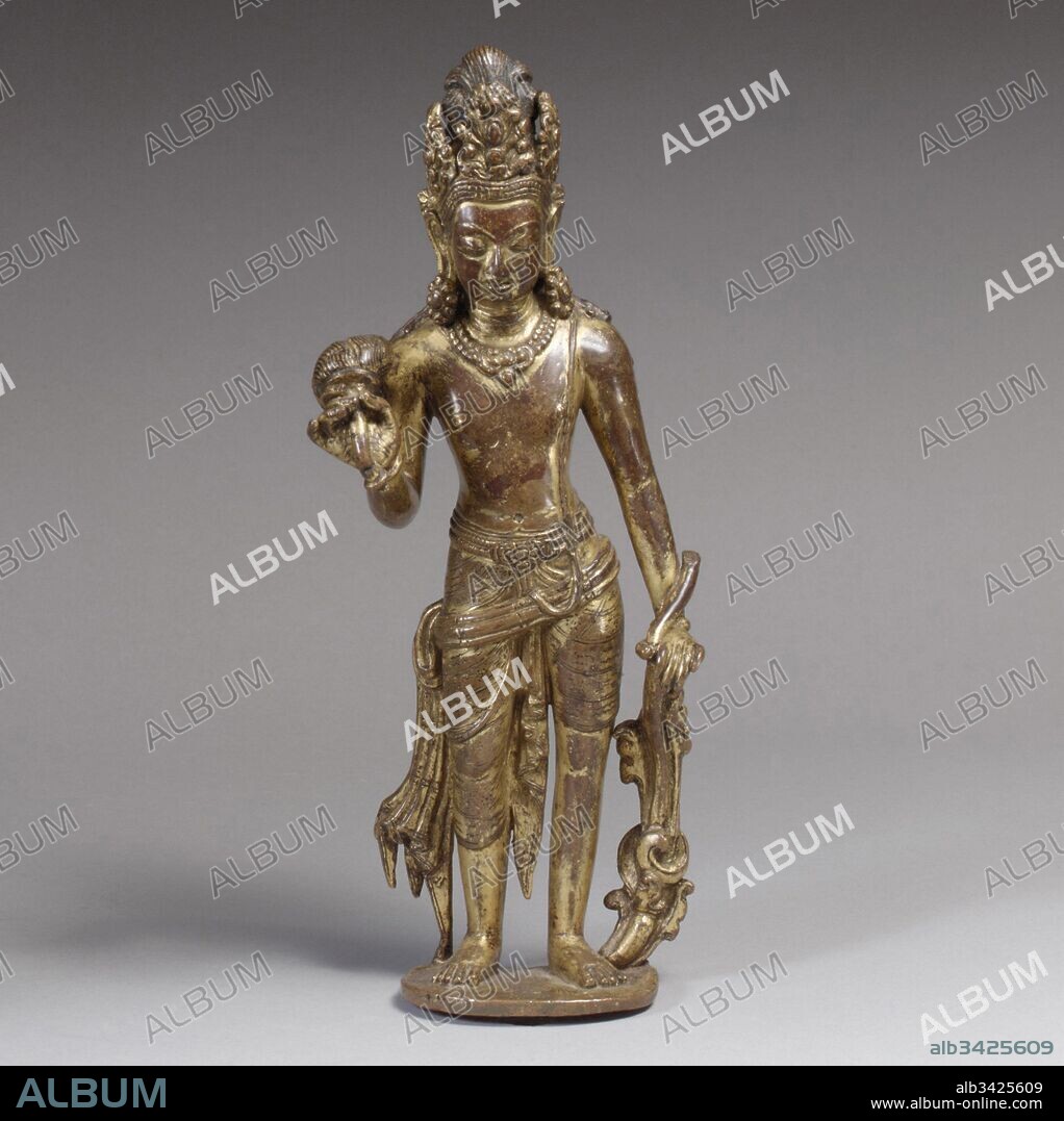 Bodhisattva, probably Padmapani Lokeshvara, Licchavi–Thakuri periods, 10th–11th century, Nepal (Kathmandu Valley), Gilt copper alloy, H. 11 7/8 in. (30.2 cm), Sculpture, This bodhisattva, richly bejeweled and crowned, holds a flywhisk in his raised hand, indicating that he was designed to attend an image of the Buddha. Stylistically, this work belongs to the transitional post-Licchavi period, when eastern Indian Pala influences are evident in the greater adornment and elaboration of detail.