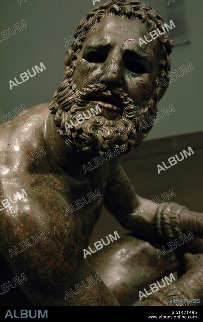 Greek Art. Hellenistic. Boxer of Quirinal or the Terme Boxer. Bronze sculpture of the Hellenistic period (1st century B.C.). Boxer sitting at rest, with metal and leather dressings used for combat. Palazzo Massimo. National Roman Museum. Rome. italy.