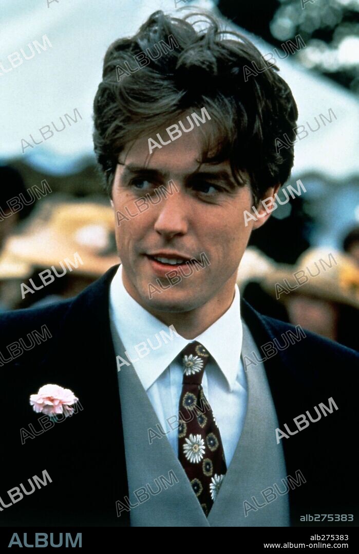 HUGH GRANT en CUATRO BODAS Y UN FUNERAL, 1994 (FOUR WEDDINGS AND A FUNERAL), dirigida por MIKE NEWELL. Copyright GRAMERCY PICTURES.