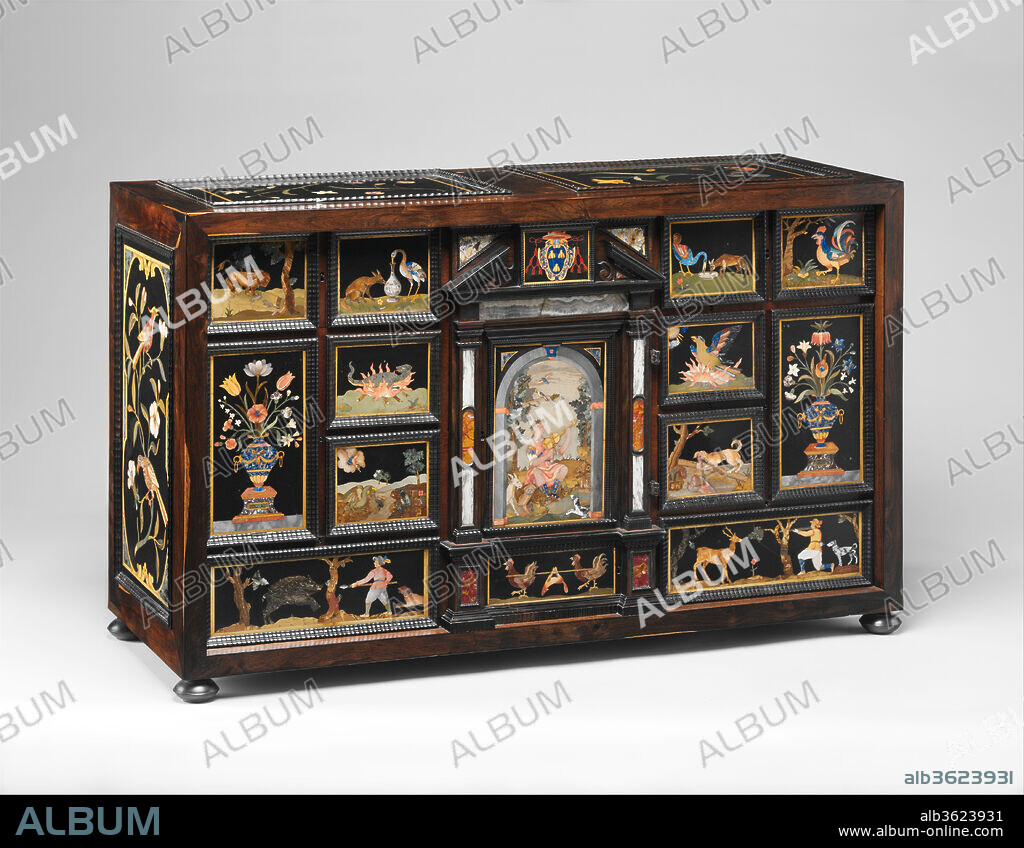 Barberini Cabinet. Artist and publisher: After woodcut illustrations by Francesco Del Tuppo (Italian, 1443/44-1501) , published in Naples in 1485. Culture: Italian, Florence. Dimensions: 23 1/4 x 38 1/8 x 14 1/8 in. (59.1 x 96.8 x 35.9 cm). Maker: Galleria dei Lavori, Florence. Date: ca. 1606-23.
"The Barberini family in the later sixteenth and seventeenth centuries presents a virtual paradigm of the well-managed Roman family. The Barberini recognized that the way to power and wealth lay through the Church and that the perpetuation of the family was dependent on marriage; and they accordingly consistently pursued both of those channels of family development. For several generations they were blessed with sufficient male offspring, and they managed this natural resource to the benefit of the family as a whole."[1] In line with this tradition, Maffeo (1568-1644), the second youngest of Antonio Barberini's six sons, left Florence in 1584, to take up residence and continue his education at the Collegio Romano in Rome as a protégé of his uncle Monsignor Francesco Barberini (1528-1600), the apostolic protonotary.[2] Maffeo later graduated from Pisa University as doctor of law. He returned to Rome in 1588-89 to embark on a meteoric ascent through the ecclesiastical hierarchy of the Vatican. From 1604 to 1607 he was accredited as papal nuncio to Henry IV's court in Paris, following an initial legation to France in 1602. This first Bourbon king (r. 1589-1610) had married Maria de' Medici (1573-1642), who came from Florence, the town where Maffeo was born and most of his family still lived. In the culturally stimulating environment of Paris, Maffeo acquired a refined taste for the arts and enjoyed many luxuries that had previously been beyond his reach. It may have been in Paris, too, that he redesigned the Barberini coat of arms for his own use, changing the wasps into bees and adding the sun symbol and laurel leaves of Apollo, patron of poets.[3] After his appointment to the Sacred College of Cardinals in 1606, he added a galero, the flat, red wide brimmed cardinal's hat adorned with scarlet tassels. 
These arms are set like a jewel in the center of the Museum cabinet's pediment. Three golden bees stand out against a lapis lazuli ground within a scrollwork cartouche that is embellished with stylized laurel sprigs and leaves and is surmounted by the galero. Probably because the panel is small, the galero is shown with six tassels on each side instead of the fifteen appropriate for a cardinal. Maffeo Barberini was elected pope on 6 August 1623 and took the name Urban VIII. Eager to immortalize his pontificate and to secure a place for his family among Europe's aristocracy, he became a great patron of the arts and named his brother and three of his nephews cardinals. This nepotism made the Barberini family rich beyond measure, and their building programs changed the appearance of Baroque Rome.[4] The Barberini bees and laurel leaves appear on many of Urban VIII's commissions, one of the most significant of which was the baldachin designed by Gianlorenzo Bernini (1598-1680) and built between 1624 and 1633 in Saint Peter's.[5]
On the door of the central compartment of the Museum's cabinet Orpheus, the legendary Thracian poet, is seen playing a lira da braccio, an early type of viol, and charming various button-eyed animals and grotesque beasts with his music. Clare Vincent has noted that "this panel is flanked by six subjects of animal cunning or foolishness taken from woodcuts in Francisco Tuppo's Aesop's Fables (Naples, 1485). These include the greedy dog who drops his morsel while trying to gobble up the one reflected in the water-the reflection is cleverly achieved in reverse-painted rock crystal. Below are animals hunting and hunted, with a witty revenge of cocks on their hunter, a fox."[6] In comparison with the poetic Orpheus scene above, this merciless illustration - the cocks are carrying the dead beast home on a stick - bespeaks an awareness of sudden changes in which a pleasant life is turned "upside down" into tragedy. 
The panels to left and right of the door, in the top register, show the salamander, impervious to fire (fig. 13), and the phoenix, a bird that according to classical myth lived for centuries and then burned itself to ashes, from which a new, young phoenix arose. The salamander was an emblem of Francis I of France (1494-1547) - a celebrated patron of art and poetry such as Maffeo wished to be - and the phoenix was the device of Pope Clement VIII (1536-1605), who had granted Maffeo the position of nuncio at the French court.[7] This logical interpretation of the panels' symbolism has been questioned by Michael Bohr, who dated the cabinet much later, to about 1665-75;[8] it is difficult, however, to dismiss the revised Barberini coat of arms as evidence that the cabinet's first owner was the young Florentine who had been papal nuncio at the court of Henry IV. There is subtler evidence, too, that connects the cabinet with Maffeo. The phoenix, which symbolizes chastity and resurrection, looks up toward the sun that represents Apollo, the god who played for the Muses on Mount Parnassus as Orpheus played for the animals. Apollo is often represented with a crown of laurel in recognition of his achievements as patron of poetry and music.[9] As we have seen, both laurels and the Apollonian sun were added by Maffeo to his arms, the presence of which at the top of the cabinet reinforces the looser symbolism of the other plaques on this outstanding piece of furniture, which is clearly intended to glorify the owner as artist and as arbiter of the arts.
Only the exact dating of the cabinet remains mysterious. In 1606, when Maffeo was made a cardinal, he could still be considered a "son of Florence." That the cabinet was a propaganda gift from the grand dukes of Tuscany, the family of Maria de' Medici, to Maffeo on that occasion is speculative but possible. Yet the subject matter of the panels suggests an intimate knowledge of Maffeo's ambitions, and it seems more likely that he commissioned the cabinet himself or that it was a present from his own family or friends in honor of his elevation to cardinal, or of some other auspicious event that occurred between 1606 and August 1623, when he adopted the papal coat of arms.[10]
The pietre dure plaques reflect the high technical standard of the grand-ducal workshop in Florence, the Galleria dei Lavori.[11] Large panels with floral branches and colorful birds executed after designs possibly provided by Jacopo Ligozzi (1547-1626) decorate the cabinet's sides and-very unusually-the top. This suggests that the cabinet was originally supported on a low stand that would permit close viewing of the top from above. The stand was most likely a simple table draped with precious fabric. All the panels are framed by ripple moldings that are designed to catch the light, especially that of candles in a dark room.[12]
The carcase construction of the cabinet and its ripple moldings relate it to a cabinet made for the Medici, now in the Palazzo Vecchio in Florence, dating to about 1615-20,[13] and to a cabinet in the National Gallery of Canada, Ottawa.[14] The technical perfection of the works seems to indicate that all three pieces were produced by German craftsmen settled in Florence. The employment of several German craftsmen at the Galleria is documented, as is the unusual fact that some of them owned their tools and lathes, which they may have brought with them from Germany.[15] Oak is rarely used in the construction of contemporary Florentine cabinets.[16] Nevertheless, we know that some foreign masters brought with them the materials they were accustomed to use and received reimbursement later. Given the sumptuousness of the other materials used on the Museum's cabinet, especially the exotic snakewood on the front between the drawers, the extra expense for oak to create a stable construction seems minor.[17]
The Orpheus scene is based on an etching by Antonio Tempesta (1555-1630).[18] The theme appears also on the imitation damascened-iron fittings on Milanese furniture and on cast-bronze plaques.[19] The theme would become one of the Galleria's most popular products: no less than eighteen pieces of furniture, each with a slightly varied central Orpheus plaque and different animal panels, are documented.[20] This indicates that panels could be commissioned separately and then mounted later according to the taste of the individual patron. The most impressive examples are a show cabinet of 1660-70 in the collection of Juan March Ordinas at Palau March in Palma de Mallorca[21] and at the Château de Beloeil, Mons, Belgium, a pair of Sicilian cabinets with red coral mounts surrounding the pietre dure panels.[22] The Barberini cabinet seems to be by far the earliest and most elaborately conceived object of this extensive group depicting Orpheus charming the animals.
[Wolfram Koeppe 2006]
Footnotes:
[1] Patricia Waddy. Seventeenth-Century Roman Palaces: Use and the Art of the Plan. New York, 1990, p. 128.
[2] On the life and papacy of Maffeo Barberini, Pope Urban VIII, see The Dictionary of Art. Ed. Jane Turner. 34 vols. New York, 1996, vol. 3, pp. 205-7 (entry by John Beldon Scott); Sebastian Schütze, Kardinal Maffeo Barberini, später Papst Urban VIII., als Auftraggeber und Mäzen: Beiträge zu einer Archäologie des römischen Hochbarok. Römische Forschungen der Bibliotheca Hertziana 32. Munich, 2005 (I thank Olga Raggio for bringing this important reference to my attention); and Catholic Encyclopedia (online at www.newadvent.org/cathen/15218b.htm).
[3] The Dictionary of Art. Ed. Jane Turner. 34 vols. New York, 1996, vol. 3, p. 205 (entry by John Beldon Scott).
[4] Patricia Waddy. Seventeenth-Century Roman Palaces: Use and the Art of the Plan. New York, 1990, p. 130.
[5] These four bronze spiral columns are covered with laurel branches. Several other works of art commissioned by the Barberini family in the pope's honor include this specific floral motif. Allegory of Divine Providence, a fresco by Pietro da Cortona (1596-1669) in the Palazzo Barberini ordered by Urban's nephew Cardinal Francesco Barberini, idealizes the pope's pontificate, his moral standards, and his political and especially his poetic skills. The center is dominated by the papal arms, three bees encircled by a laurel wreath. A putto nearby holds the laurel crown awarded to worthy poets. See The Dictionary of Art. Ed. Jane Turner. 34 vols. New York, 1996, vol. 3, pp. 206-7 (entry by John Beldon Scott).
[6] The Metropolitan Museum of Art. Recent Acquisitions: A Selection, 1987-1988. New York, 1988, pp. 28-29 (entry by Clare Vincent). For the woodcuts, see Francesco Tuppo, ed. and trans. Aesopus: Vita e Fabulae. Naples, 1485. Repr.: Ed. Carlo Zucchetti. Milan, 1963, fabulae 2, 6, 18, 23, 35.
[7] The Metropolitan Museum of Art. Recent Acquisitions: A Selection, 1987-1988. New York, 1988, p. 29 (entry by Clare Vincent); and Jack Freiburg, The Lateran in 1600: Christian Concord in Counter-Reformation Rome. Cambridge and New York, 1995. The salamander was also at this time an emblem of France. On the facade of San Luigi dei Francesi (the French church in Rome, completed 1589), the salamander guards the portals. On the left is the device of Francis I with his motto "Nutrisco et extingo" (I nourish and destroy), but on the right the salamander is surrounded by the legend "Erit Chri[s]tianorim lumen in igne" (The light of the Christians will be in the fire).
[8] Michael Bohr. Die Entwicklung der Kabinettschräncke in Florenz. Europäische Hochschulschriften, ser. 38, Kunstgeschichte 182. Frankfurt am main, 1993, pp. 200-203, no. III.
[9] James Hall. Dictionary of Subjects and Symbols in Art. Rev. ed. New York, 1979, p. 26.
[10] Jacques Martin. Heraldry in the Vatican/L'araldica in Vaticano/Heraldik im Vatikan. Gerrards Cross, Buckinghamshire, England, 1987, pp. 133-36.
[11] Anna Maria Giusti, Paolo Mazzoni, and Annapaula Pampaloni Martelli, Il Museo dell'Opificio delle Pietre Dure a Firenze. Gallerie e musei di Firenze. Milan, 1978; Umberto Baldini, Anna Maria Giusti, and Annapaula Pampaloni Martelli, eds. La Capella dei Principi e le pietre dure a Firenze. Gallerie e musei di Firenze, Milan, 1979; and Pierre Ramond. Chefs-d'oeuvre des marqueteurs. Vol. I, Des origines à Louis XIV. Dourdan, 1994, pp. 63-66.
[12] For these moldings, see Josef Maria Greber. Die Geschichte des Hobels von der Steinzeit bis zum Entstehen der Holzwerkzeugfabriken im frühen 19. Jahrhundert. Zurich, 1956, pp. 335-38; and Wolfram Koeppe. Die Lemmers-Danforth-Sammlung Wetzlar: Europäische Wohnkultur aus Renaissance und Barock. Heidelberg, 1992, pp. 103-4, no. M38.
[13] Umberto Baldini, Anna Maria Giusti, and Annapaula Pampaloni Martelli, eds. La Capella dei Principi e le pietre dure a Firenze. Gallerie e musei di Firenze, Milan, 1979, pp. 291-92, no. 101, pl. 143.
[14] Acc. no. 28145
[15] Michael Bohr. Die Entwicklung der Kabinettschräncke in Florenz. Europäische Hochschulschriften, ser. 38, Kunstgeschichte 182. Frankfurt am main, 1993, p. 16
[16] Ibid., pp. 200-203, no. III.
[17] Alvar González-Palacios. Mosaici e pietre dure: Firenze, paesi germanici, Madrid. I quaderni dell'antiquariato. Collana di arti decorative 21, year 2. Milan, 1982, p. 38; and Michael Bohr. Die Entwicklung der Kabinettschräncke in Florenz. Europäische Hochschulschriften, ser. 38, Kunstgeschichte 182. Frankfurt am main, 1993, pp. 311-12, doc. no. 317.
[18] Sebastian Buffa, ed. Italian Masters of the Sixteenth Century: Antonio Tempesta. The Illustrated Bartsch 37. New York, 1984, p. 124.
[19] Peter Hughes. The Wallace Collection: Catalogue of Furniture. 3 vols. London, 1996, vol. 1, p. 126, no. 21; and Christopher Wilk, ed. Western Furniture, 1350 to the Present Day, in the Victoria and Albert Museum, London. London, 1996, p. 62, figs. 1, 2 (entry by Tessa Murdoch).
[20] Information in the archives of the Department of European Sculpture and Decorative Arts, Metropolitan Museum.
[21] Juan José Junquera y Mato. Spanish Splendor: Great Palaces, Castles, and Country Houses. New York, 1992, p. 261. I was not able to examine the March cabinet personally for this study.
[22] Jean Gismondi and Isabelle Richard. "Le Corail: Symbole antique, fétiche populaire et joyau baroque." In Les Antiquaires...au Grand Palais: XIVe Biennale Internationale, 22 september-9 octobre 1988, pp. 87-99. Paris, 1988, fig. 9. I am grateful to H.S.H. the prince de Ligne, Château de Beloeil, Belgium, for bringing this information to my attention.