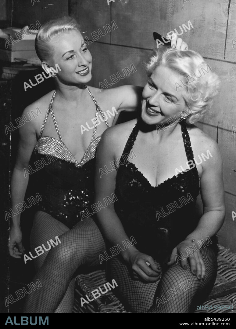 A quick check-up for Dolores Gay and Dolores Marlin, before going on in the Spike Jones Show. March 31, 1955.;A quick check-up for Dolores Gay and Dolores Marlin, before going on in the Spike Jones Show.