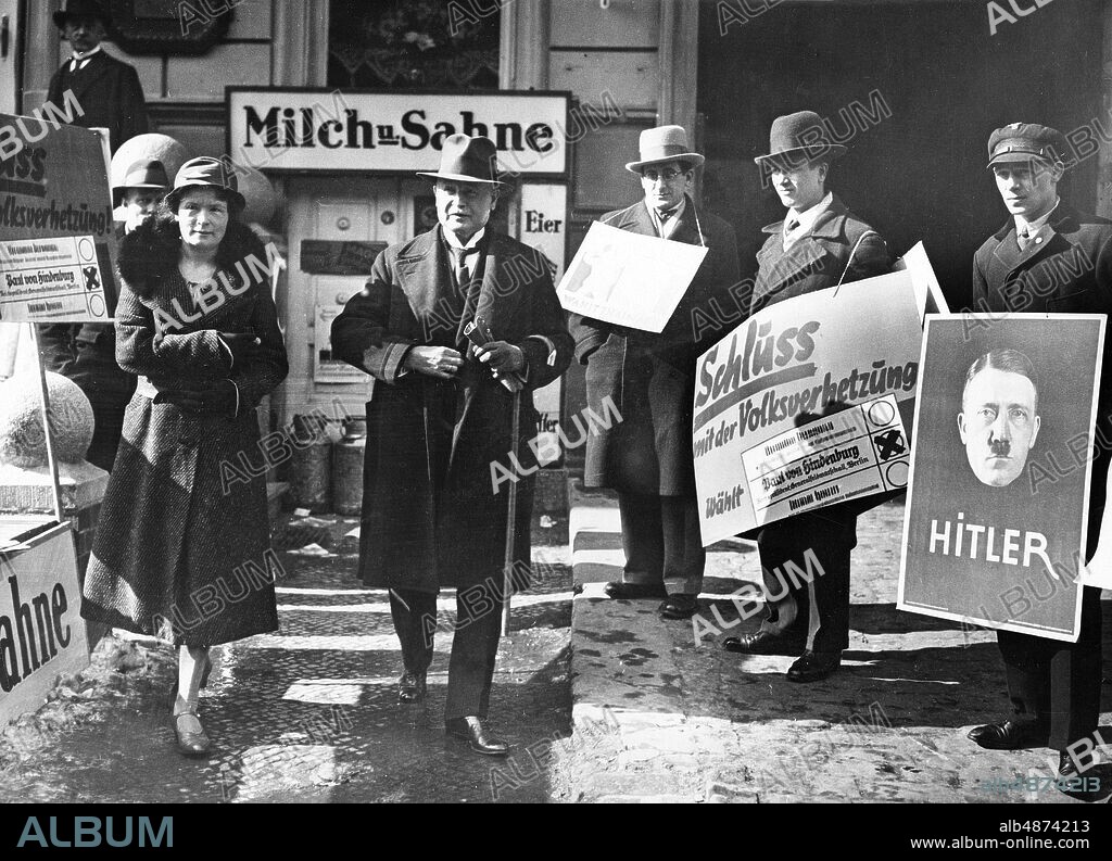 GERMANY BERLIN 1932-03-13. Orig. caption ... GERMANY'S INTERNAL AND REICHSWEHRMINISTER ELECTED BERLIN - In the polling station on Bendlerstrasse in Berlin, on March 13, 1932, the day of the Reich presidential election, the German Minister of the Interior and Reichswehr Dr. Wilhelm Groener cast his vote for the election. U.B.z. Reichsminister Dr. Wilhelm Groener and his wife leave the polling station. Photo: AB Text & Bilder / SVT / Code: 5600 Folder: Germany Presidential election 1932-03-13 Election day 4937 W Groener, 1867-1939, German military and politician, 1928-32 Minister of Defense, 1931-32 at the same time Minister of the Interior. Election campaign Poster Adolf Hitler persons: RUTH GROENER; WILHELM GROENER sites: BERLIN; GERMANY.