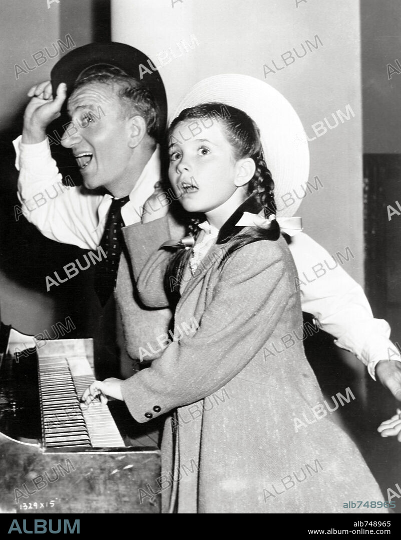 JIMMY DURANTE and MARGARET O'BRIEN in MUSIC FOR MILLIONS, 1944, directed by HENRY KOSTER. Copyright METRO GOLDWYN MAYER.