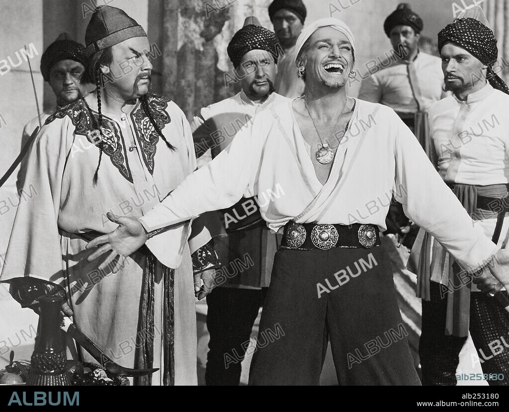 DOUGLAS FAIRBANKS JR. and WALTER SLEZAK in SINBAD, THE SAILOR, 1947, directed by RICHARD WALLACE. Copyright RKO.