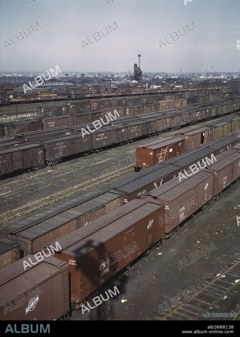 April/May 1943 - General view of part of the Proviso yard of the Chicago and Northwestern railroad, Chicago, Illinois. In the background is the coal chute and roundhouse.