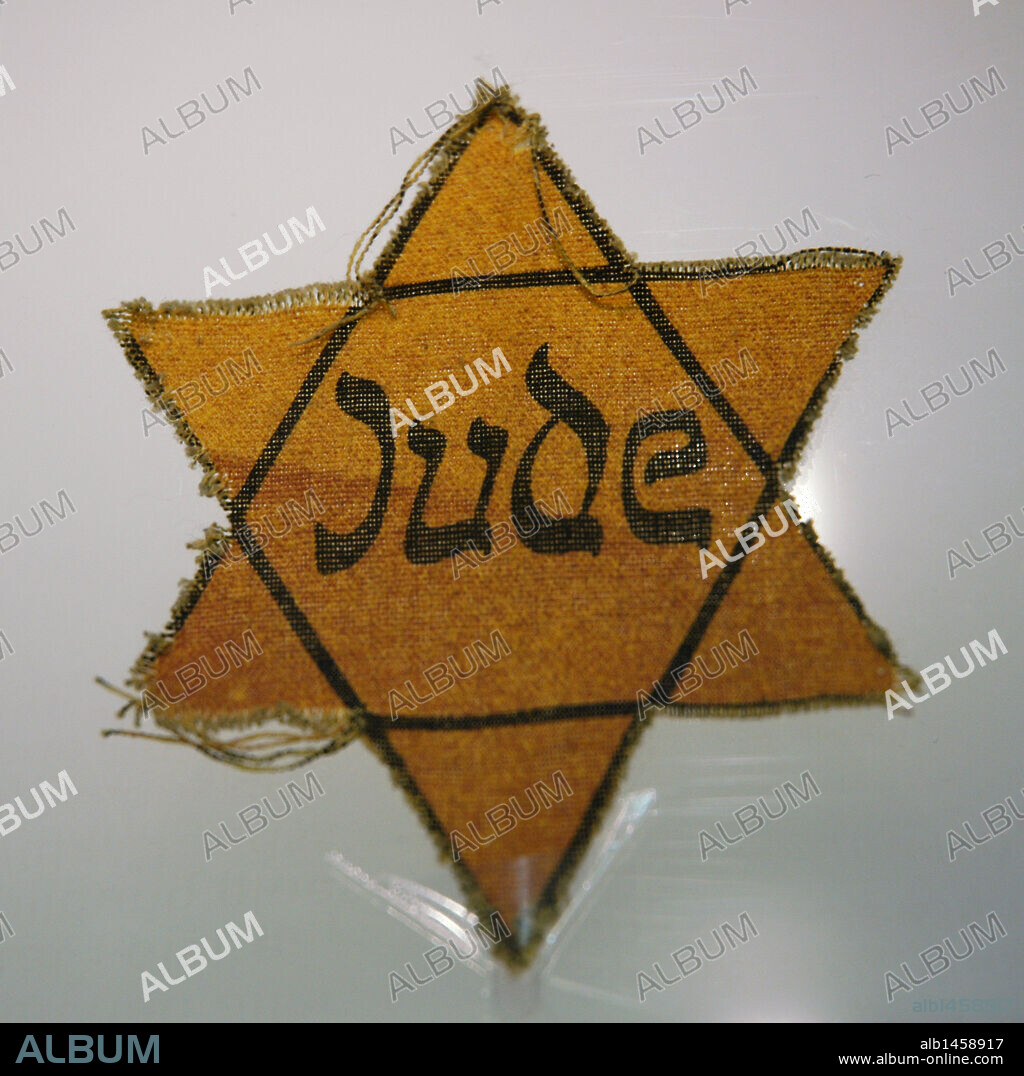 Star worn by Jewish prisoners. Sachsenhausen concentration camp Museum. Oranienburg. Germany.