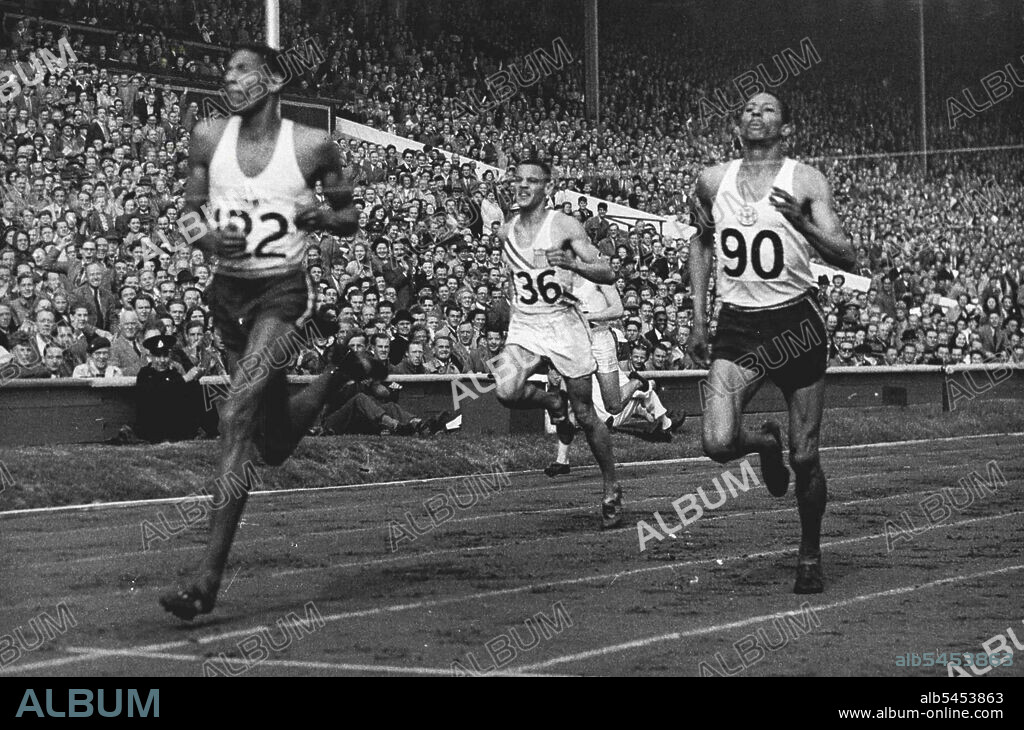 Olympic Games 1948 - ***** 400 metres final - Arthur Wint of Jamaica gaining for the British Empire the first Olympic win, when he won the Final of the 400 metres in 46.2 sec. (equalling the Olympic record) from Herbert McKenley, Jamaica, second and M. Whitfield of the U.S.A. who was third. August 05, 1948.