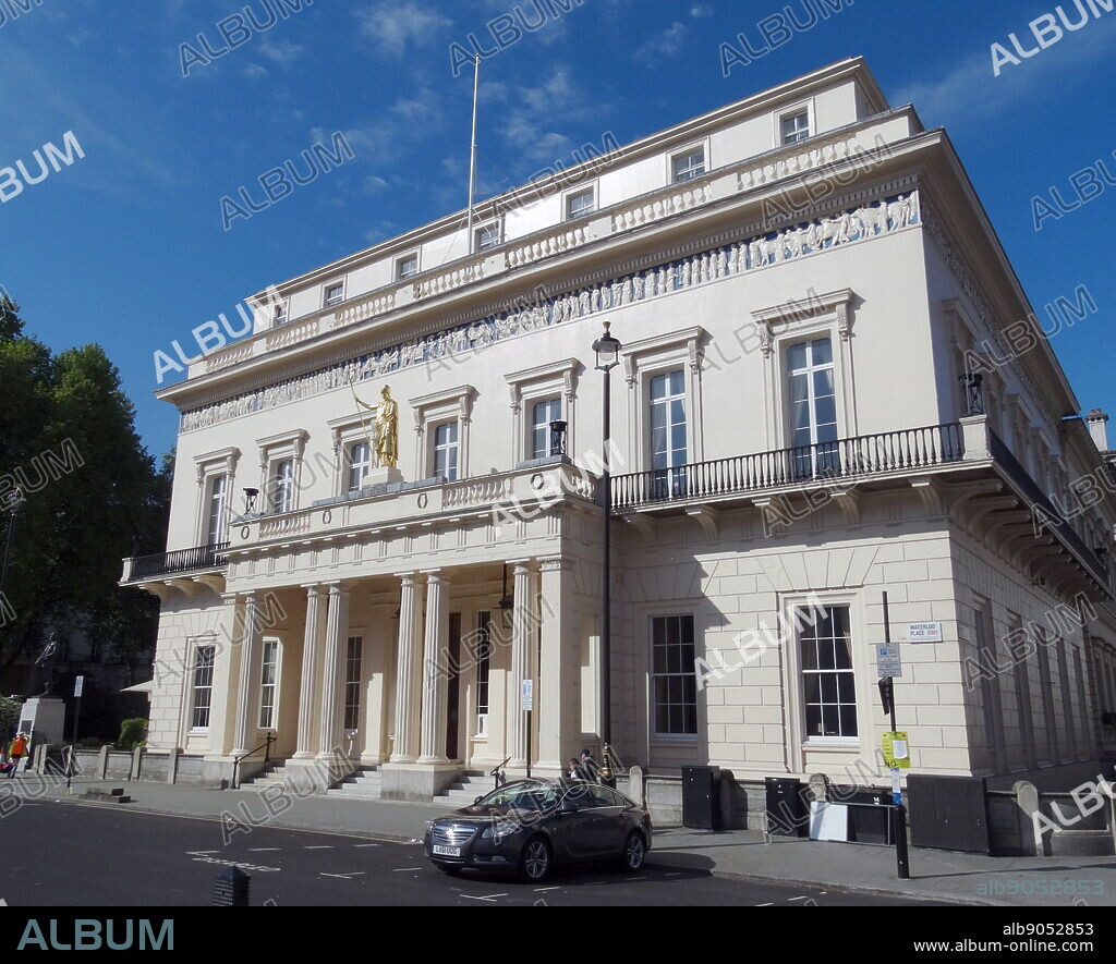 The Athenaeum is a private members' club in London, founded in 1824. It was designed by Decimus Burton in the Neoclassical style with a Doric portico, above which is a statue of the classical goddess of wisdom, Athena. The bas-relief frieze is a copy of the frieze round the Parthenon in Athens.