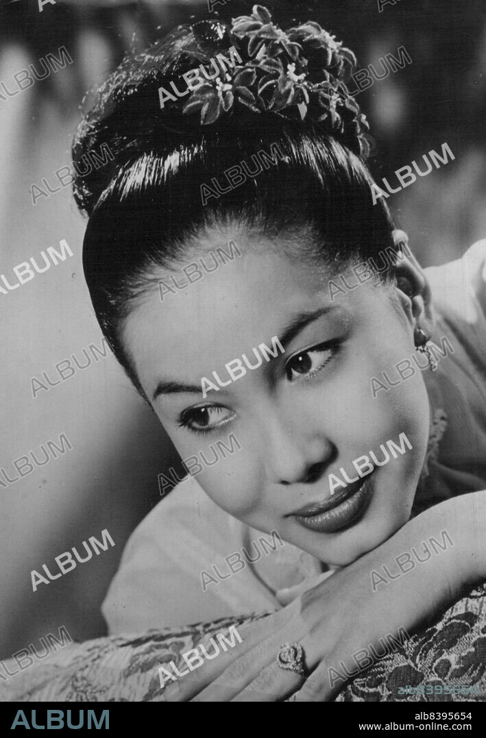 Burmese Beauty -- Beautiful 21-year-old Win Min than has been selected for the leading role opposite Gregory Peck in a new Technicolour film "The Purple Plain".
Win Min Than (Roughly Translated her names "Brilliant a Thousandfold" was born in Pegu - 50 miles from Rangoon.
She is 5ft. sins tall and at one time was a Pupil of the Ballet Rambert in England.
She was discovered when amateur photographer sent a picture producer who was in Burma. He interviewed her and on ***** return to England sent for her - after three week's screen testing he decided she was a born actress.  March 9, 1954. (Photo by Paul Popper, Paul Popper Ltd.).