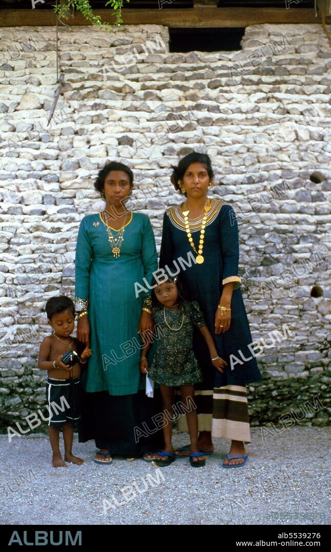 Asia's smallest and least-known nation, the Republic of Maldives, lies scattered from north to south across a 750-kilometre sweep of the Indian Ocean 500 kilometres south-west of Sri Lanka. More than 1000 islands, together with innumerable banks and reefs, are grouped in a chain of nineteen atolls which extends from a point due west of Colombo to just south of the equator. The atolls, formed of great rings of coral based on the submarine Laccadive-Chagos ridge, vary greatly in size. Some are only a few kilometres square, but in the far south the great atoll of Suvadiva is sixty-five kilometres across, and has a central lagoon of more than 2000 square kilometres. The northern and central atolls are separated from each other by comparatively narrow channels of deep water, but in the south Suvadiva is cut off by the eighty-kilometre-wide One-and-a-half-Degree Channel. Addu Atoll is still more isolated, being separated from the atoll of Suvadiva by the seventy-kilometre-wide Equatorial Channel.