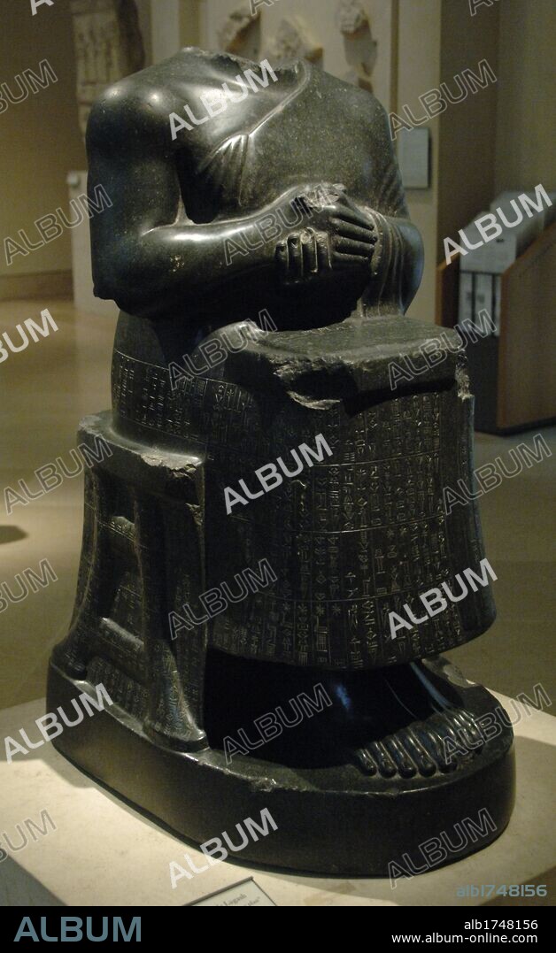 Mesopotamia. Neo-Sumerian. Ruler Gudea of state of Lagash. Diorita statue. From Girsu (modern Telloh). Iraq. 2120 BC. Museum of Louvre. Paris. France.