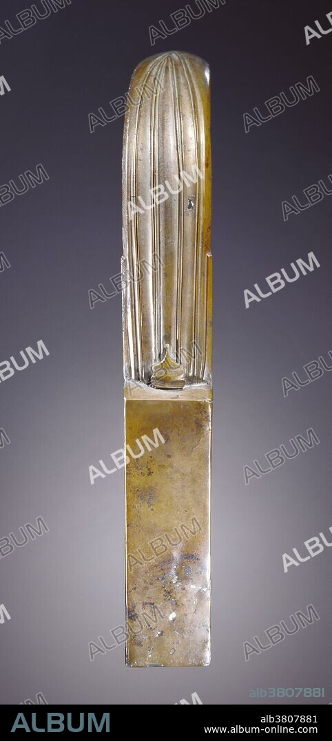 Bronze strigil from the Roman Empire, 1st century, AD. The exterior of the curved blade of the strigil is decorated with a series of incised linear channels. A strigil was a small, curved, metal tool used in ancient Greece and Rome to scrape dirt and sweat from the body before effective soaps became available. First perfumed oil was applied to the skin, and then it would be scraped off, along with the dirt. For wealthier people, this process was often done by slaves. Strigils were often used in Roman baths and were made in different sizes for different areas of the body.