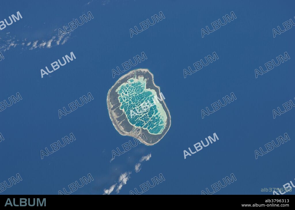 View from space of the Mataiva Atoll, the westernmost atoll of the Tuamotu Archipelago, part of French Polynesia. Mataiva Atoll is notable in that its central lagoon includes a network of ridges (white, image center) and small basins formed from eroded coral reefs. Mataiva means "nine eyes" in Tuamotuan, an allusion to nine narrow channels on the south-central portion of the island.