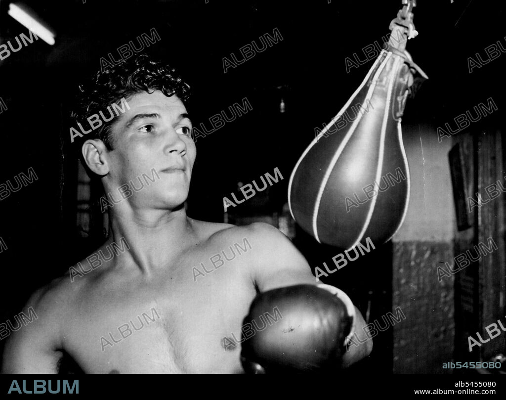 Lightweight Charlie Dunn (above) has given up a job and is devoting all his time to his fight career.He has been carrying heavy bags of sugar. He intends finding if there is more "sugar" for him in the fight game.Dunn Realise, like others have done, that conditioning for fights and a daily job clash.Dunn is matched at the Stadium next Monday night with Americo Agostini.If Dunn wins he may be matched a fortnight later with Jack Ryan, of Queensland. February 01, 1954.