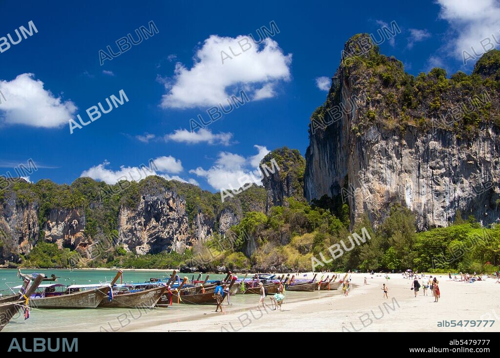 Hat Rai Leh divides into two beaches, East and West. The former, Rai Leh East, is rather muddy at low tide, and people staying here tend to frequent Rai Leh West. Hat Rai Leh West is sandier and generally more attractive. Krabi Province is made up of more than 5,000 sq km of jungle-covered hills and sharp, jagged karst outcrops, as well as more than 100km of luxuriant, pristine coastline and around 200 islands in the neighbouring Andaman Sea. About 40 per cent of the provincial population is Muslim, the remainder being predominantly Buddhist. This is a clear indication that Krabi sits astride the invisible diving line between Buddhist Thailand and the four southern provinces—Satun, Narathiwat, Yala and Pattani—which are predominantly Muslim. Far from causing any sort of problem, this adds immensely to the cultural width and diversity of the province, blending mosques with temples, Malay cooking traditions with Thai cuisine, and giving the province a pleasantly relaxed multi-cultural feel.