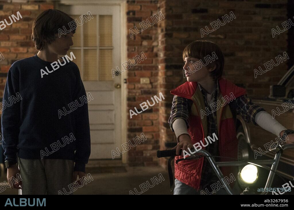FINN WOLFHARD and NOAH SCHNAPP in STRANGER THINGS, 2016, directed by MATT DUFFER and ROSS DUFFER. Copyright 21 LAPS ENT/MONKEY MASSACRE.