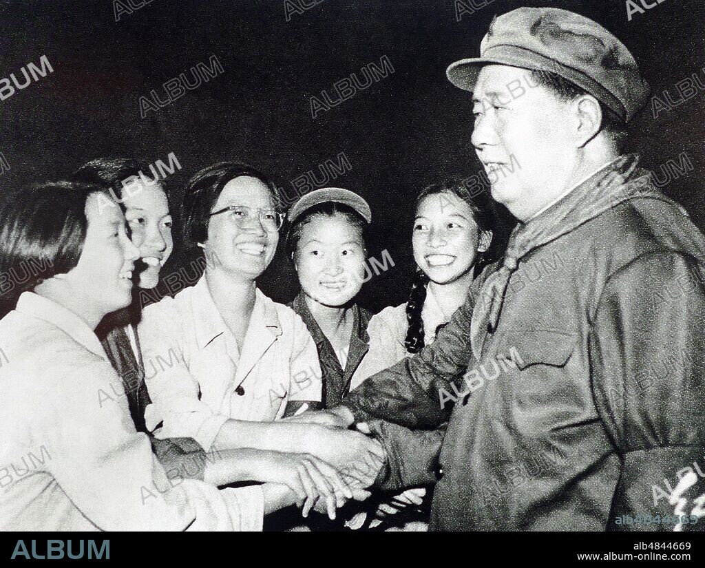 Chairman Mao with female Red Guards during the Cultural Revolution. 1966. Mao Zedong (1893 - September 9, 1976), was a Chinese communist revolutionary who became the founding father of the People's Republic of China (PRC), which he ruled as the Chairman of the Communist Party of China from its establishment in 1949 until his death.