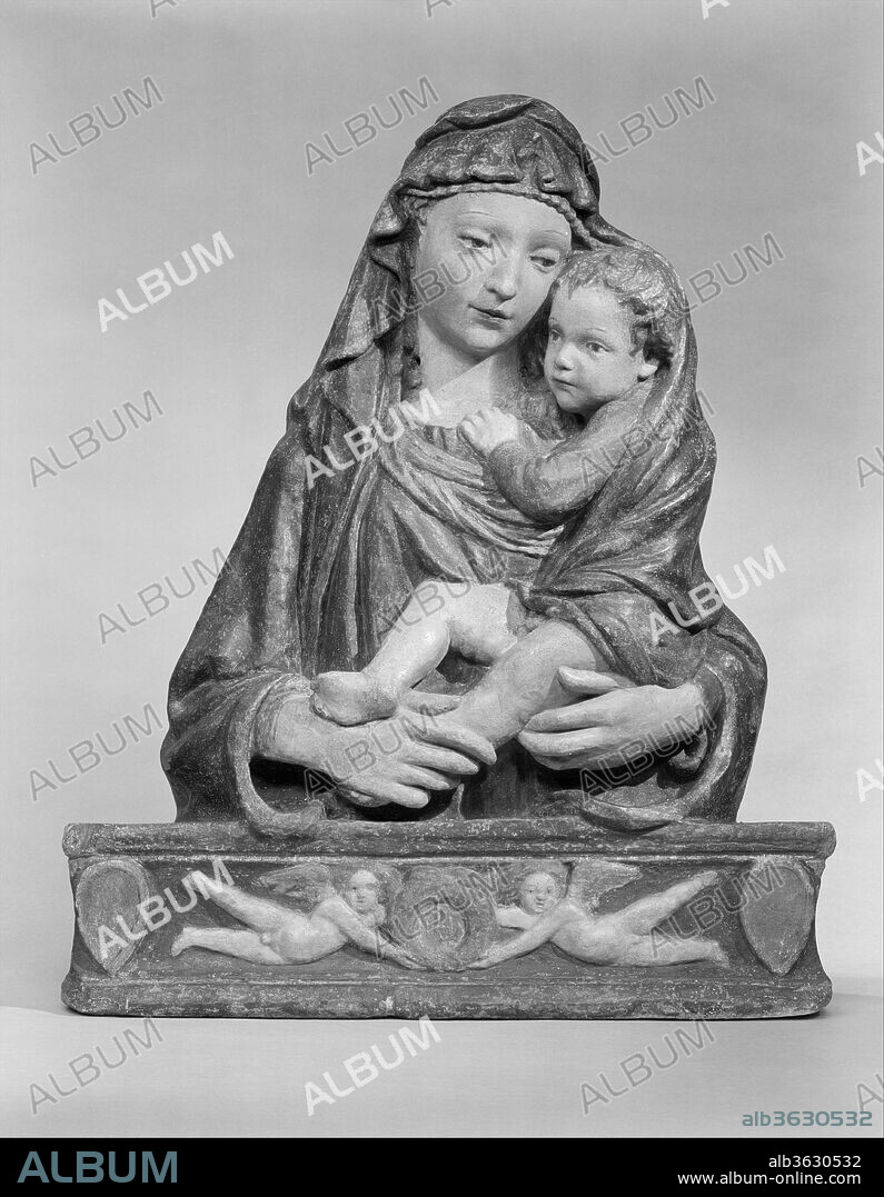 Madonna and Child. Artist: Probably after Lorenzo Ghiberti (Italian, Florence 1378-1455 Florence). Culture: Italian, Florence. Dimensions: Overall: 34 1/2 × 28 1/2 in. (87.6 × 72.4 cm). Date: ca. 1425-40.
This composition is apparently a variant of another Madonna relief which Ghiberti designed specifically to be molded and reproduced in painted stucco. See 08.22.3 for a painted stucco version of that composition. The type of base derives from the niche of the Parte Guelfa on Or San Michele by Donatello, finished in 1423. See 07.120.3 for a terracotta version of this composition.