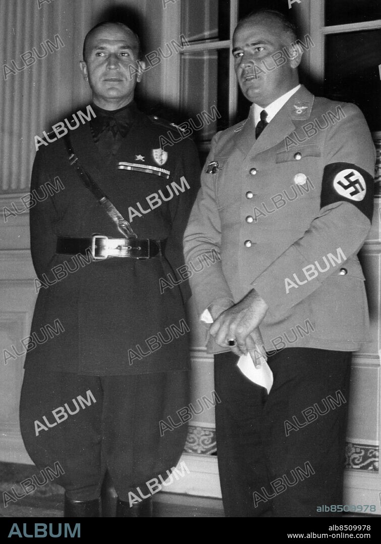 Governor-General of occupied Poland's "General Government" Hans Frank. rig. bildtext... Minister Frank empfing die Teilnehmer an dem gegenwärtig in Berlin stattfinden Komponisten-kongress im Hotel Esplanade. U.B.z. Minister Frank im Gespräch mit dem italienischen Propagandaminister Alfieri. Foto Bürge Anm. H Frank, 1900-1946, tysk jurist och politiker, nazist D Alfieri, 1886-1966, italiensk politiker, fascist Hakkors Personmapp: Frank, Hans Text & Bilder / Scherl Bielderdienst sv/v kopia persons: HANS FRANK;DINO ALFIERI sites: TYSKLAND;ITALIEN*;BERLIN. Governor-General of occupied Poland's "General Government".