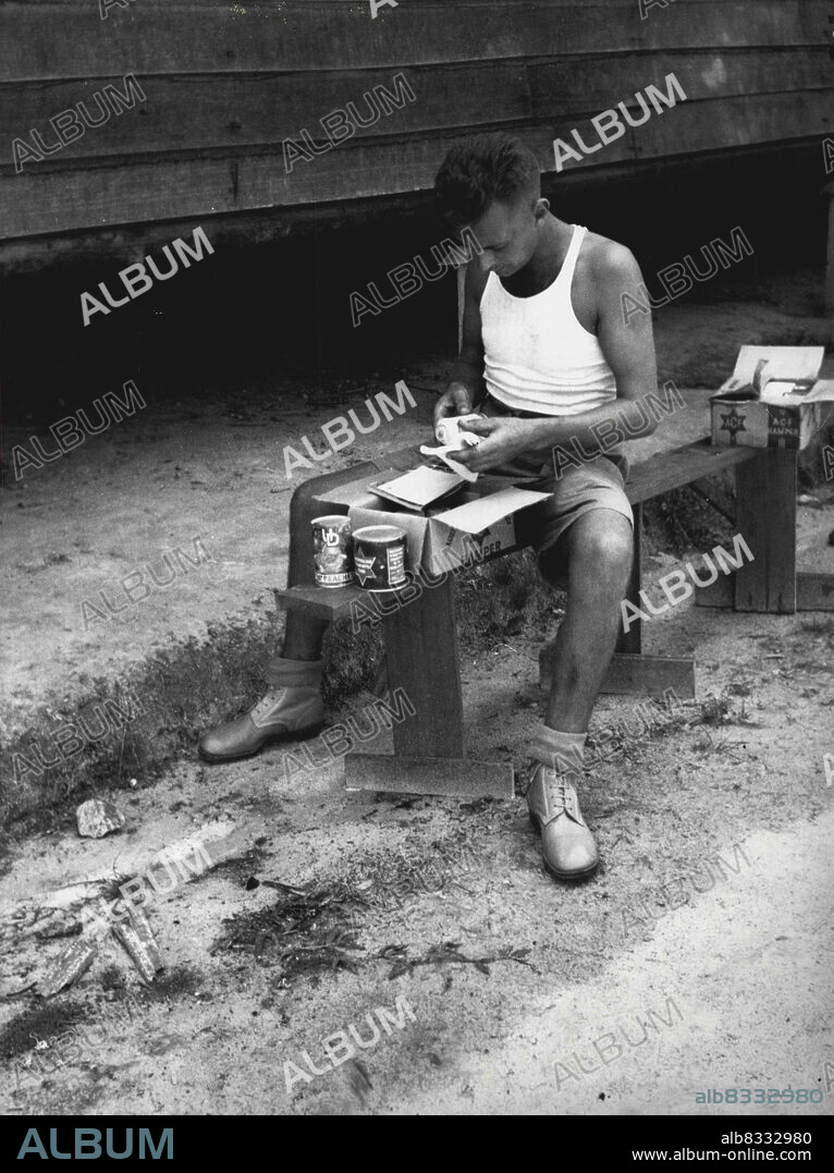 Prisoners of war released from Changi Prison Camp were evacuated from Singapore by the Australian Hospital Ship Manunda, the first Australian ship to arrive at Singapore after the surrender of the Japanene. Shown, a group of 8 Division. September 15, 1945. (Photo by Australian War Memorial Canberra).