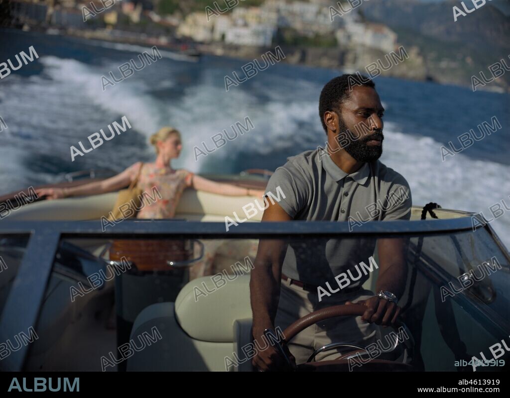 ELIZABETH DEBICKI and JOHN DAVID WASHINGTON in TENET, 2020, directed by CHRISTOPHER NOLAN. Copyright WARNER BROS PICTURES.