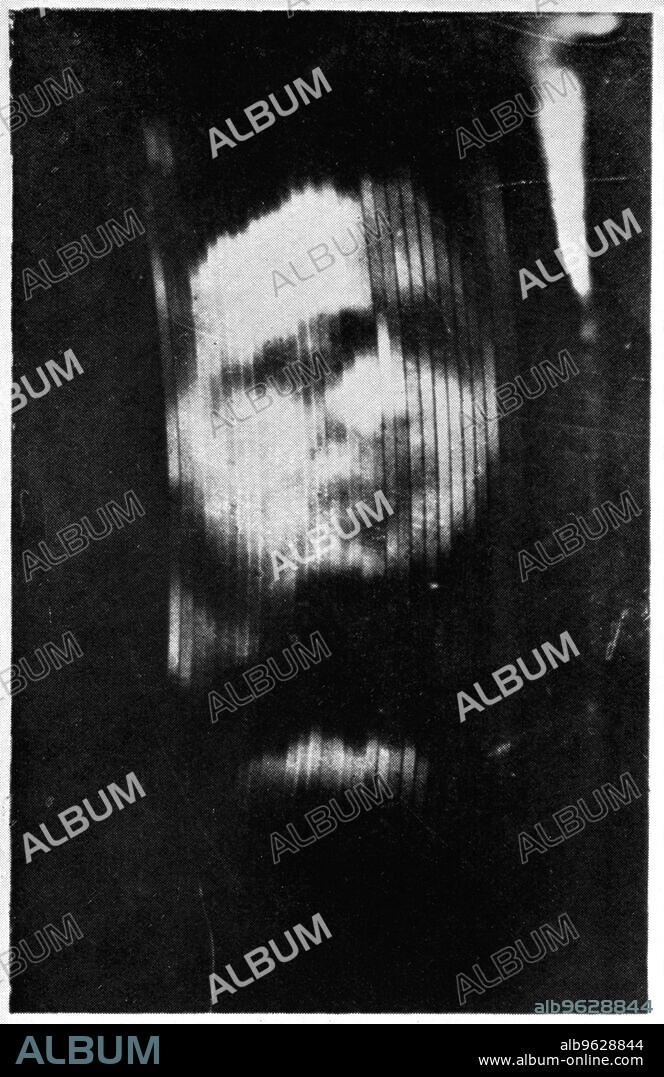 John Logie Baird's first television demonstration, 1926. Photograph taken from the screen of his first Televisor.